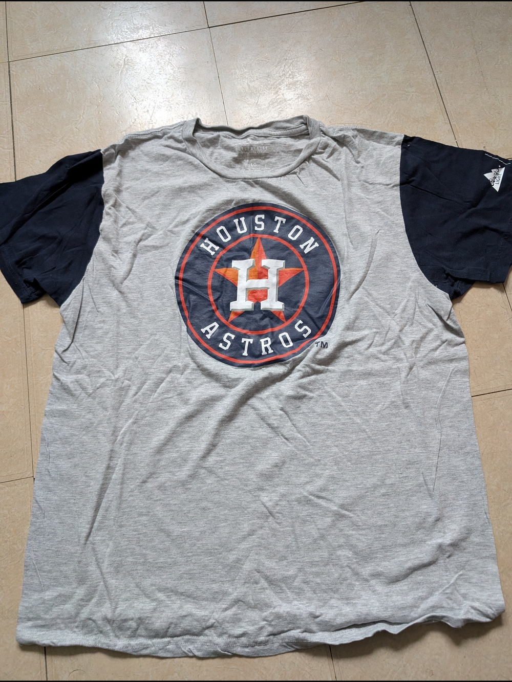 Genuine Merchandise Gray Tee with Navy and Orange Logo